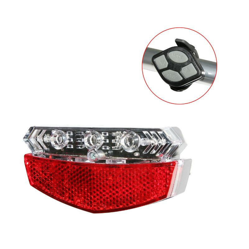 ECLAIRAGE VELO DIRECTIONNEL A PILE ARRIERE SUR PORTE-BAGAGE REFLECTOR 5 LEDS ROUGE 5 FONCTIONS AVEC CLIGNOTANT ET BOUTON INDICATEUR DE DIRECTION SANS FIL (LIVRE AVEC 2 PILES AAA) ENTRAXE 50 et 80mm